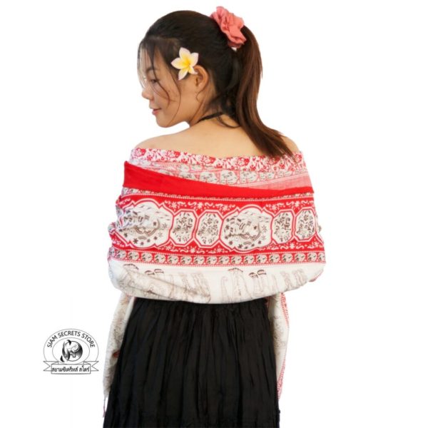 Girl wearing red beach cover-up as a shawl